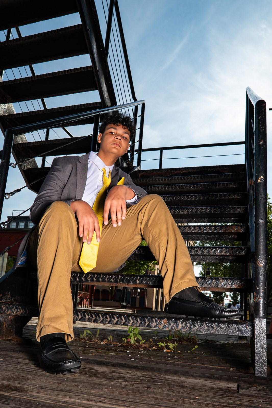 Senior portrait on a staircase, Rochester NY